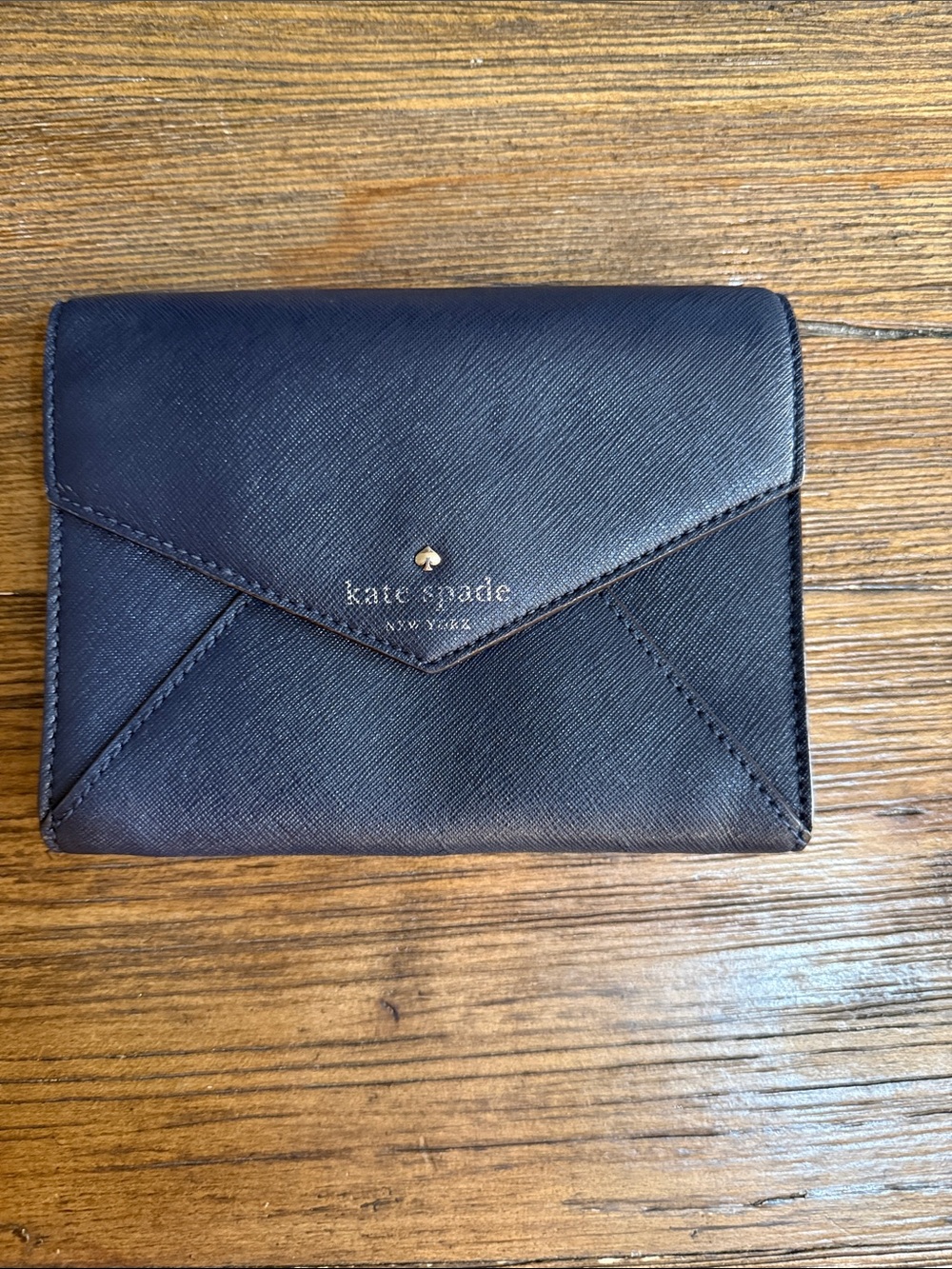 kate spade blue envelope-style bifold wallet with gold logo